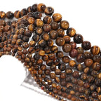 String of tiger eye beads on a white background
