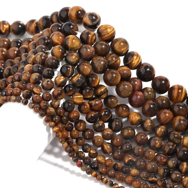 String of tiger eye beads on a white background