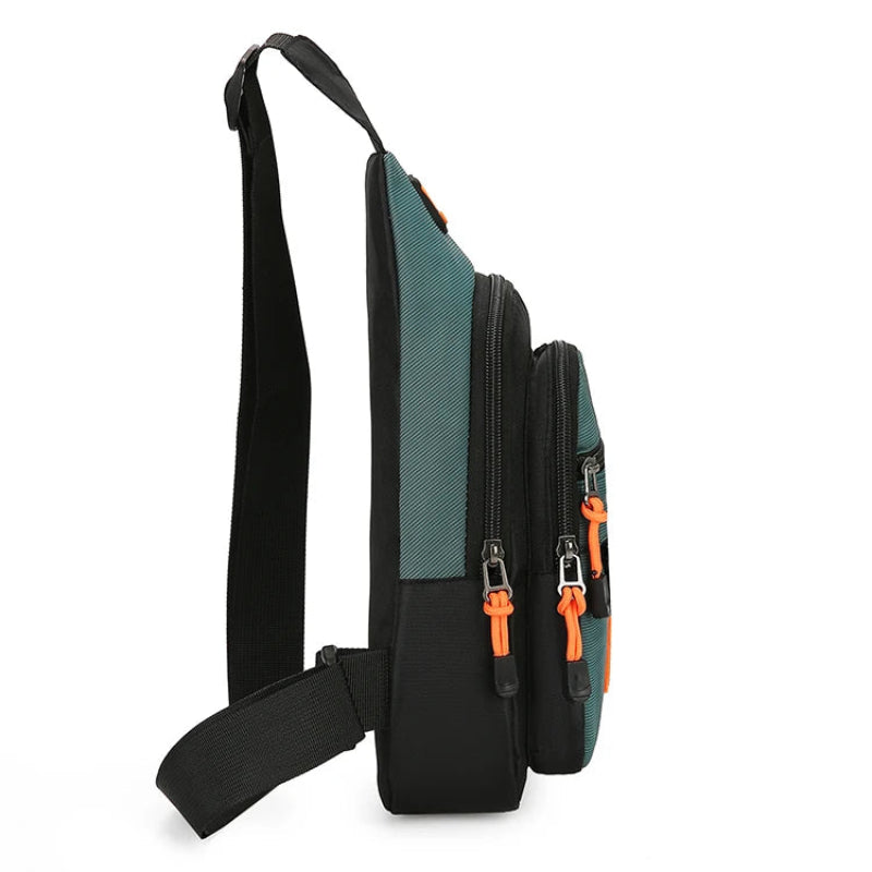 Black and green sling bag with orange zippers on a white background