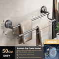 Suction cup towel holder with dimensions and features on a bathroom wall background