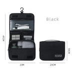 Black hanging toiletry bag with measurements on a white background