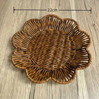Wicker placemat with dimensions on a wooden surface
