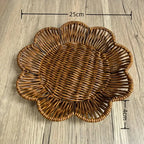 Wicker placemat with dimensions on a wooden surface