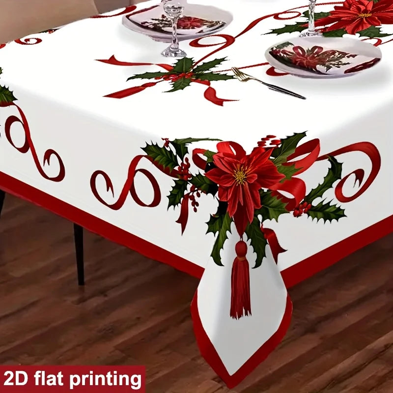 A white tablecloth with a red and green Christmas poinsettia and holly pattern, shown on a wooden floor with place settings on the table. Text in the corner reads '2D flat printing'.