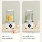 Two-panel instructional graphic showing a white and clear fabric steamer or dryer on a tabletop. The left panel shows a hand pressing a button on the device while a yellow cloth is inside; the right panel shows the device running with water inside and text instructions below.
