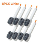 Set of 8 white cleaning brushes with gray bristles on a white background