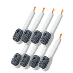 Set of 8 white cleaning brushes with gray bristles on a white background