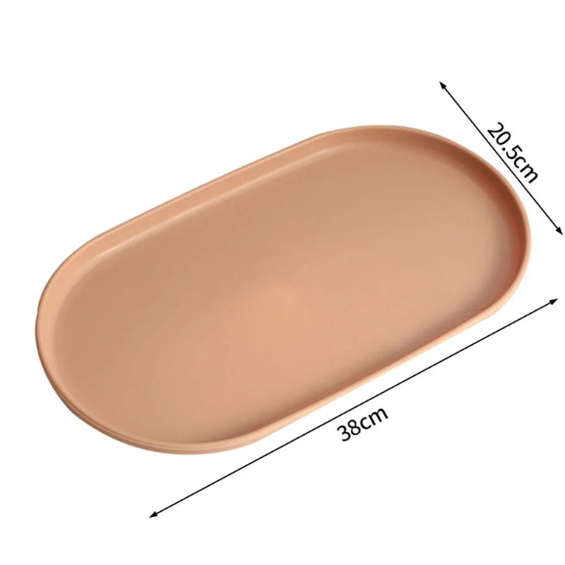 An oval orange plastic tray shown on a white background with dimension arrows and labels indicating 38 cm length and 20.5 cm width.