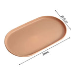 An oval orange plastic tray shown on a white background with dimension arrows and labels indicating 38 cm length and 20.5 cm width.