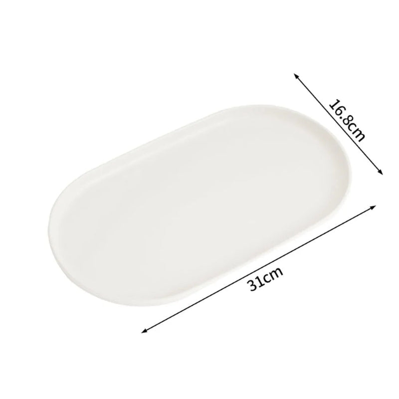 White oval tray with dimension arrows showing measurements of 31cm by 16.8cm, labeled 'White M' on a plain white background.