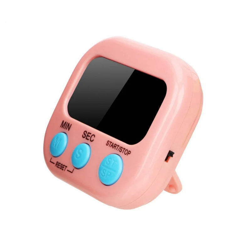 A pink digital alarm clock with a small black display screen and three light blue buttons labeled MIN, SEC, and START/STOP. The clock is shown on a plain white background with 'Pink' text in the top-left corner and 'JJYY' text in the top-right corner.