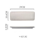 Measurement chart of a rectangular ceramic plate with dimensions and weight information.