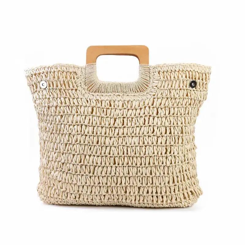 Beige woven handbag with wooden handle on a white background
