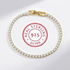 Gold bracelet with clear stones on a white background with 'Real Sterling Silver 925' stamp.