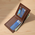 Brown leather wallet with cards and money on a wooden surface