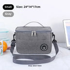 Gray cooler bag with strap on a white surface, size and color information displayed.