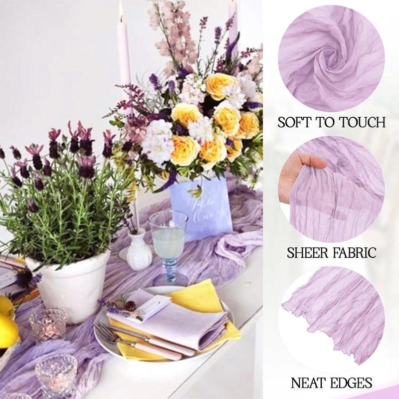 Purple tablecloth with flowers and decorative elements, showing fabric properties on the side.