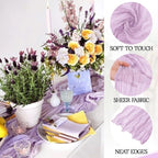 Purple tablecloth with flowers and decorative elements, showing fabric properties on the side.