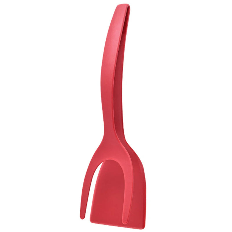 Red plastic spatula on a white background
