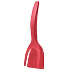 Red plastic spatula on a white background