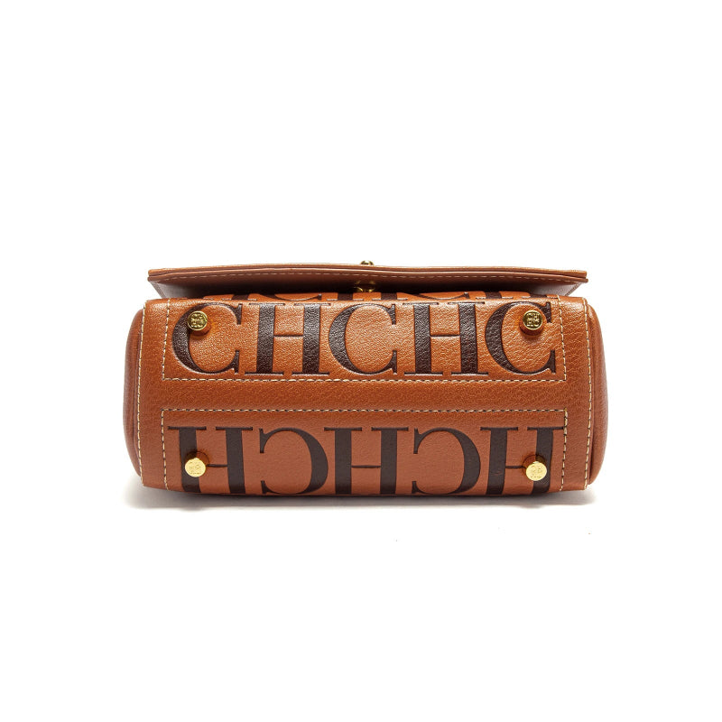 Brown handbag with 'CHLOE' branding on a white background