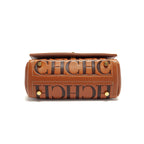 Brown handbag with 'CHLOE' branding on a white background