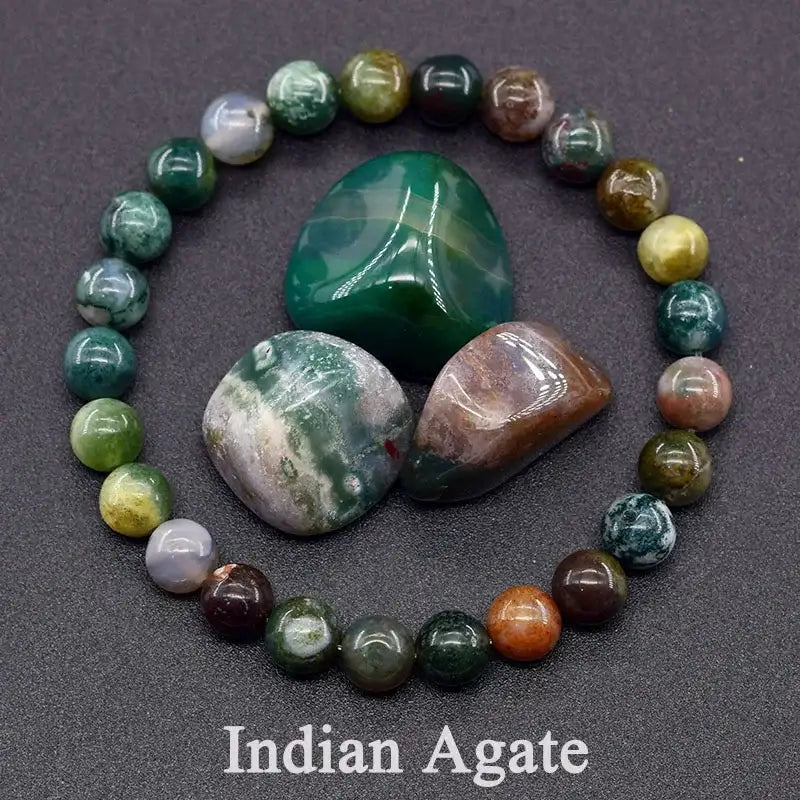 Indian Agate stones and beads on a dark background with 'Indian Agate' text.