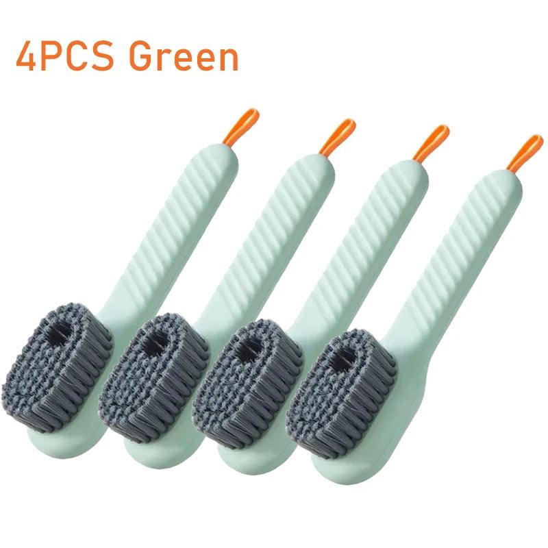 Four green scrub brushes with gray bristles on a white background