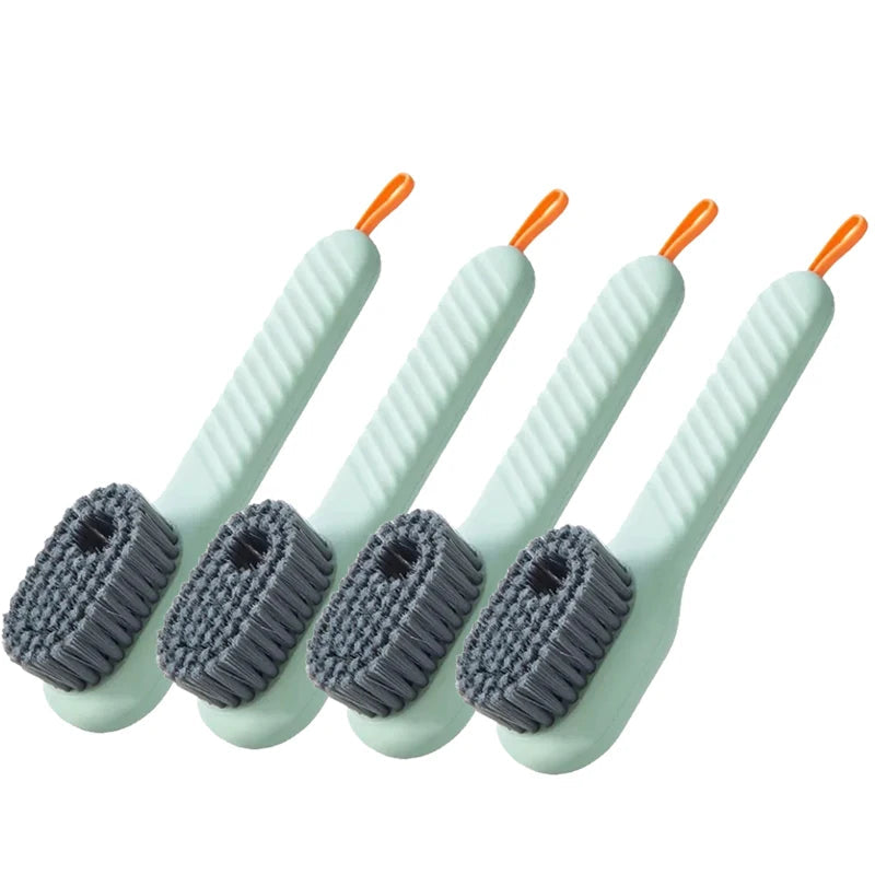 Four green scrub brushes with gray bristles on a white background