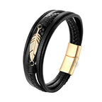 Black braided leather bracelet with gold feather charm and clasp on a white background