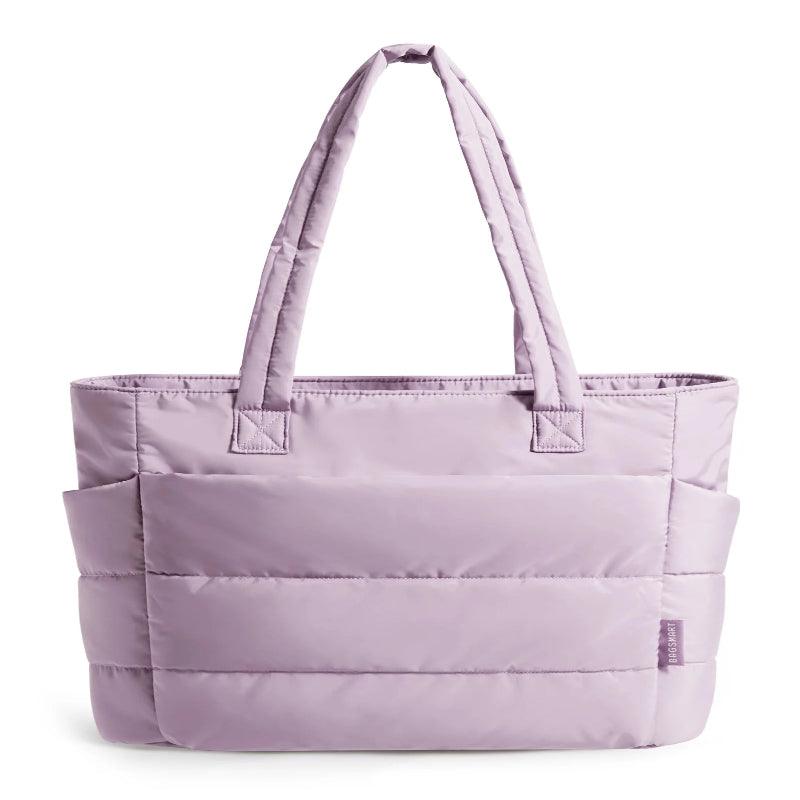 Purple tote bag with multiple compartments on a white background