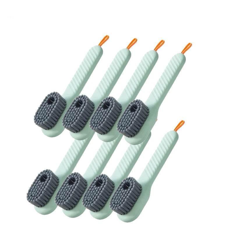 Set of 8 green cleaning brushes with gray bristles on a white background