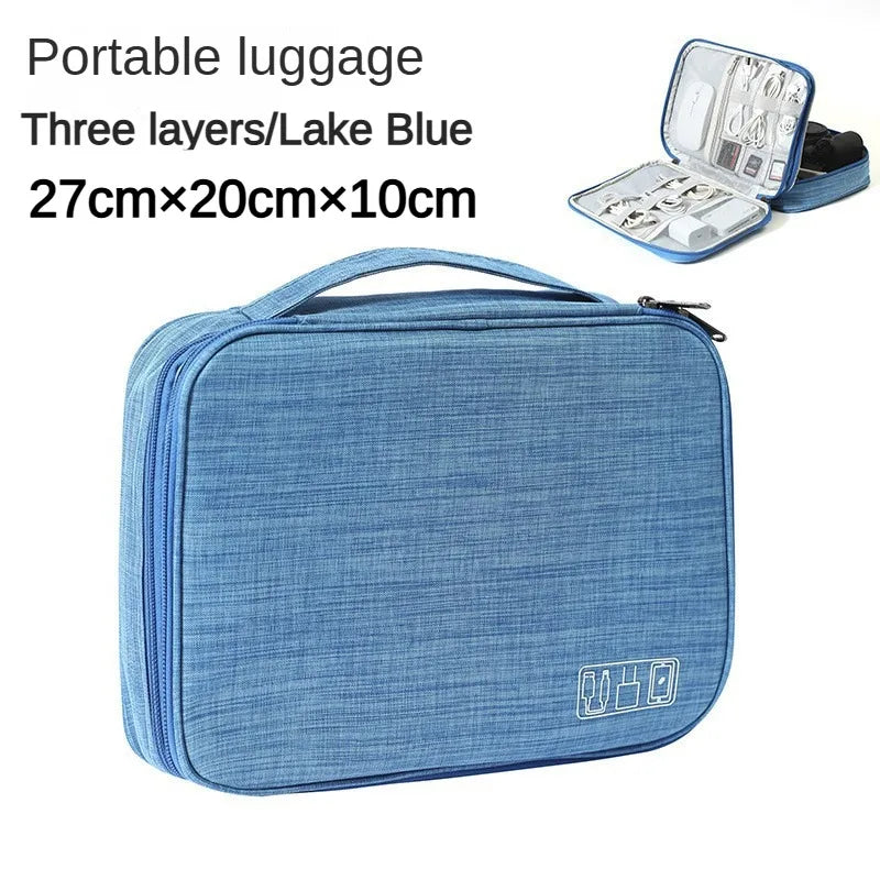 Blue portable luggage with open compartment showing items on a white background