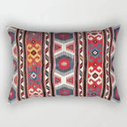 Decorative pillow with tribal pattern on a white background