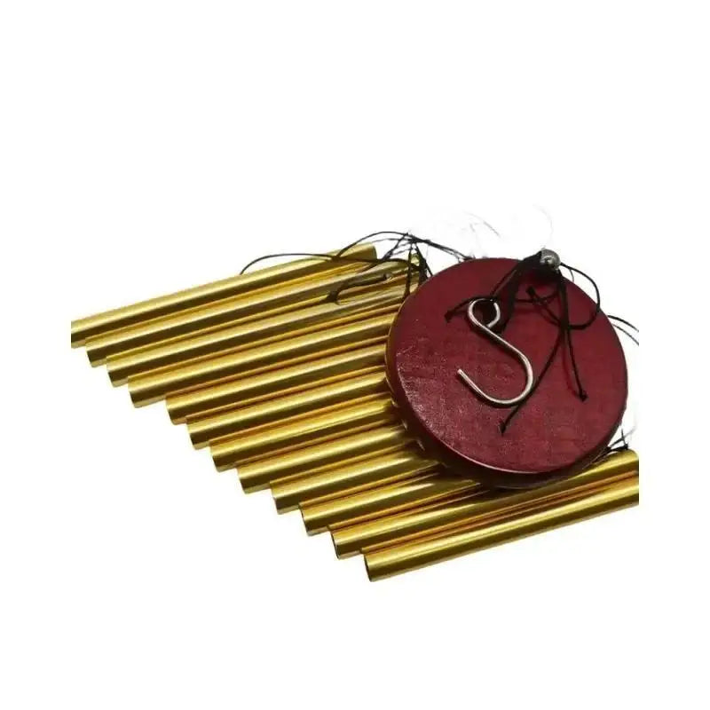 Set of gold metal tubes with a red disc and hook on a white background