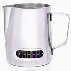 Stainless steel milk pitcher with temperature gauge on a white background