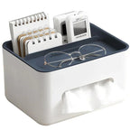 Desk organizer with tissues, glasses, and stationery items on a white background