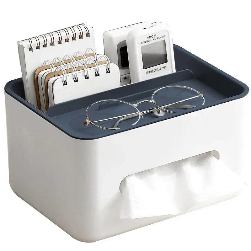Desk organizer with tissues, glasses, and stationery items on a white background