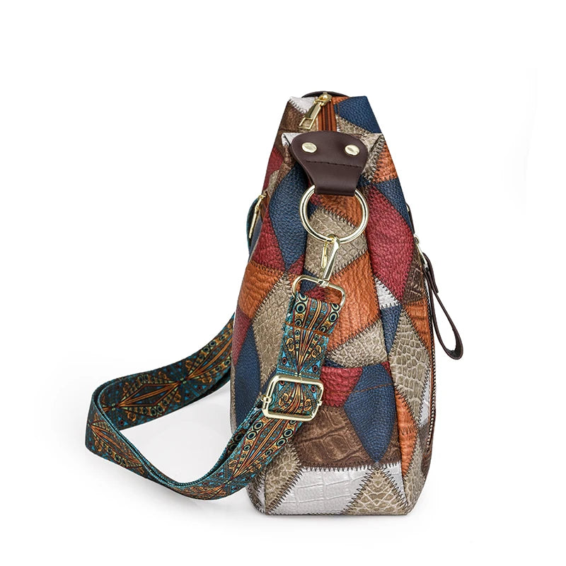 Multicolored patterned bag with a strap on a white background