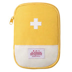 Yellow first aid kit with a white cross on a white background