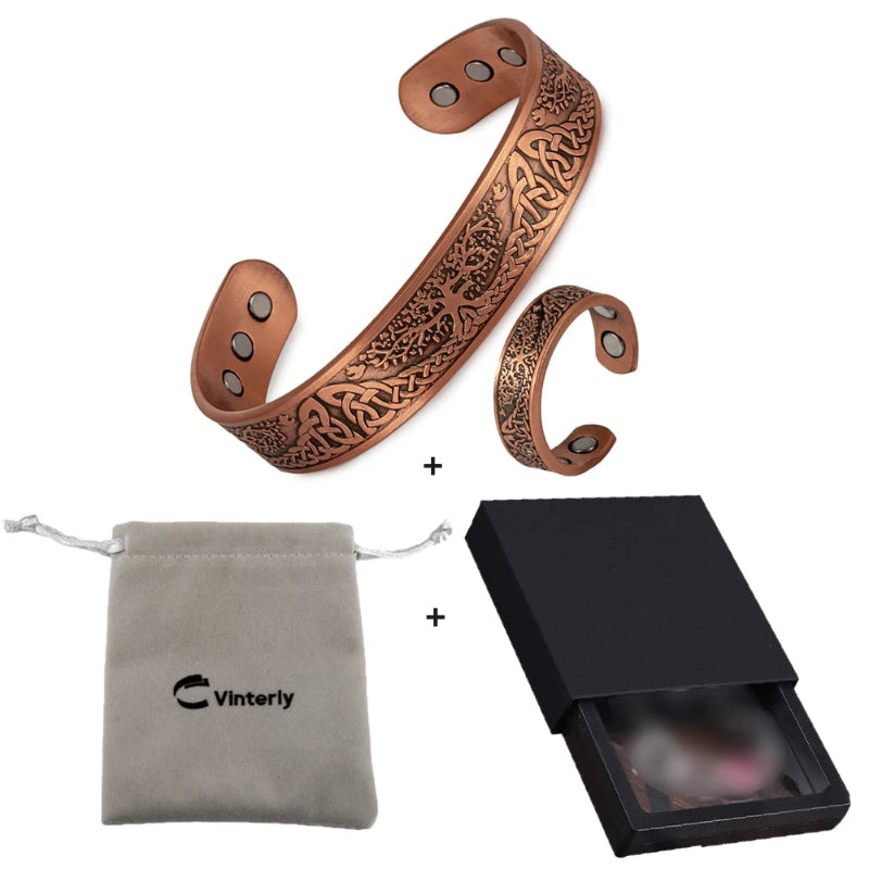 Copper bracelet with intricate designs, Vinterly pouch, and black box on a white background