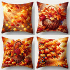 Four decorative pillows with autumn-themed designs featuring leaves, pumpkins, and a basket.