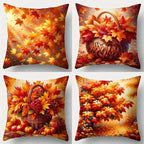 Four decorative pillows with autumn-themed designs featuring leaves, pumpkins, and a basket.