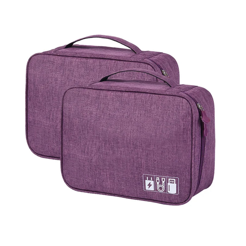 Two purple travel bags with a visible brand logo on a white background