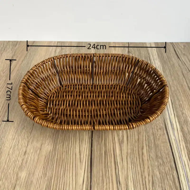 Wicker bread basket with dimensions on a wooden surface
