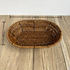 Wicker bread basket with dimensions on a wooden surface