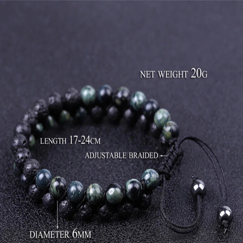 A beaded bracelet made of dark polished jasper stones with black braided cord, shown on a dark textured background with overlaid text noting net weight 20g, length 17-24cm, diameter 6mm, and Kambaba jaspers #605.