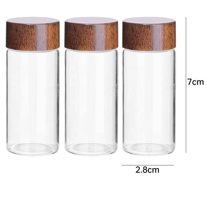 EMESA HOME Mini Glass Storage Bottles – 10/20/30ml Transparent Jars with Wooden Lids for Spices, Coffee Beans & DIY Crafts - Emesa Home
