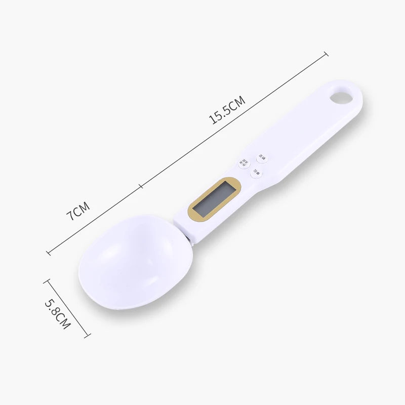 White digital measuring spoon with dimensions labeled on a white background