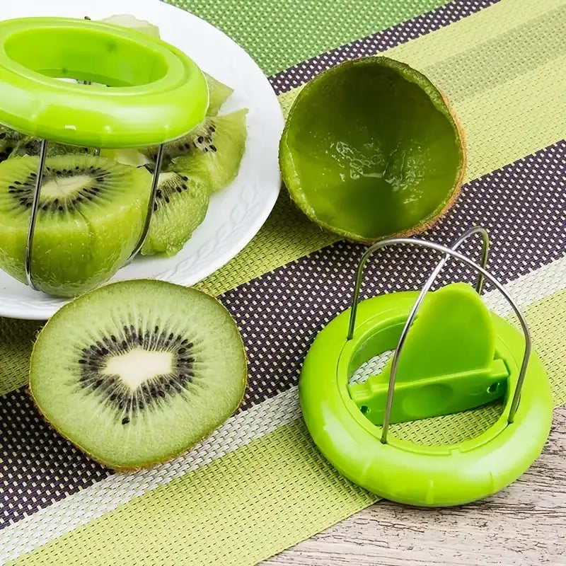 Green kiwi slicer with sliced kiwis on a striped fabric background